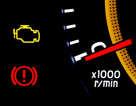 A close up photo of dashboard lights